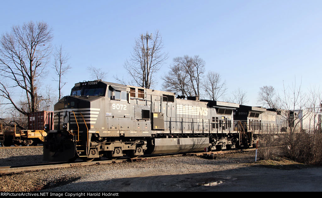 NS 9072 leads train 218 down the yard lead while 214 holds track 1